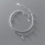 Radiant Cross Bracelet with Small Beads